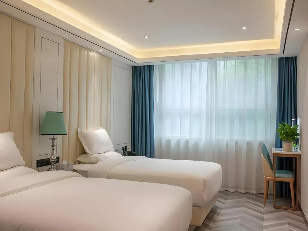 Bed in Zmax Hotel Guangzhou Railway Station