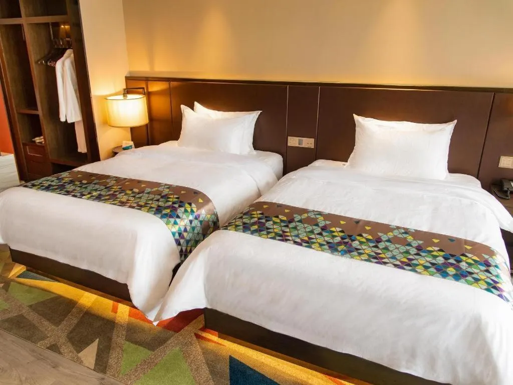 Bed in Zmax Hotel Guangzhou Railway Station