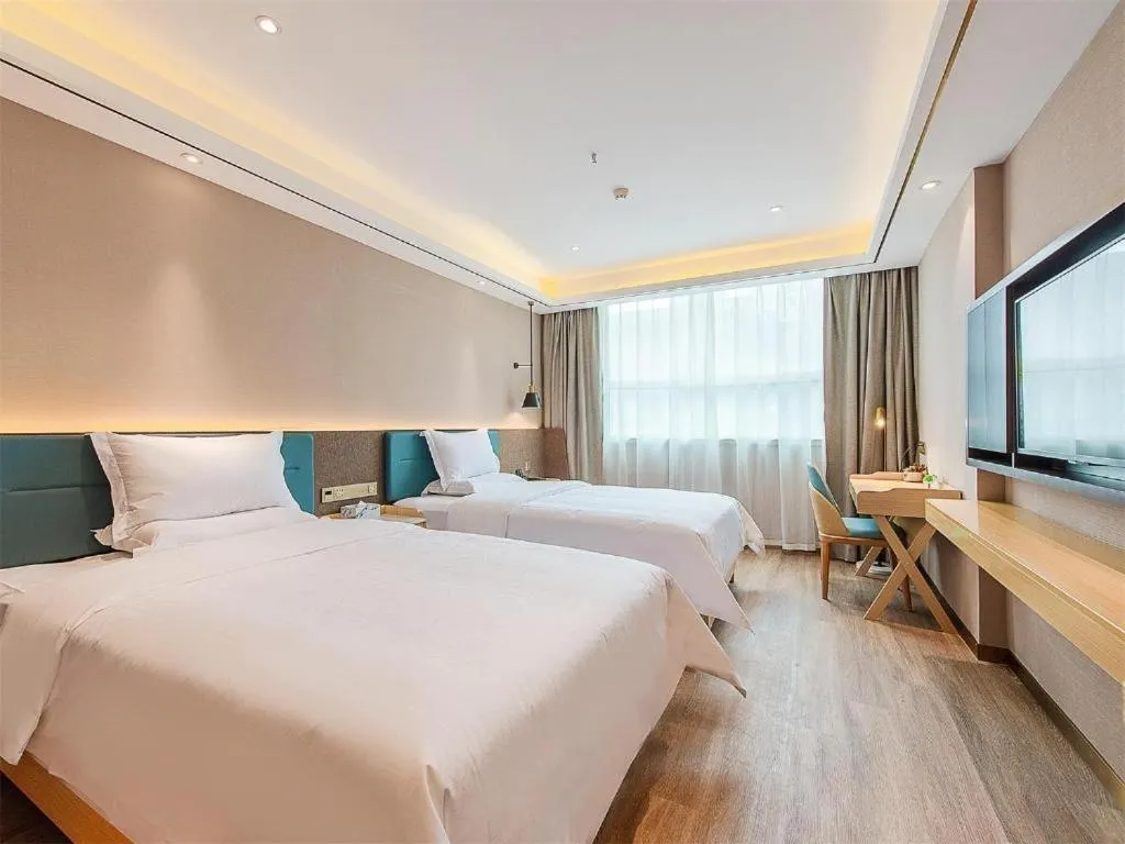 Bed in Zmax Hotel Guangzhou Railway Station