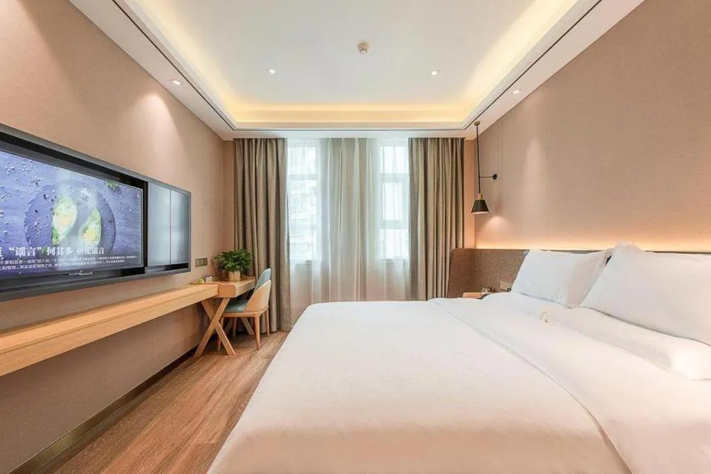 Bed in Zmax Hotel Guangzhou Railway Station