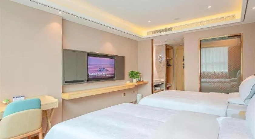 Bed in Zmax Hotel Guangzhou Railway Station