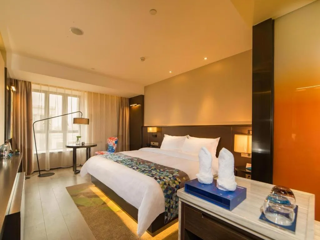 Bed in Zmax Hotel Guangzhou Railway Station