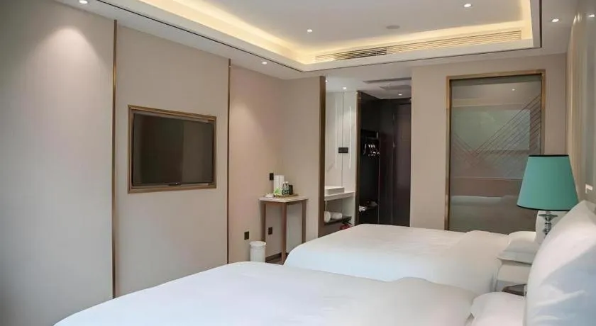 Bed in Zmax Hotel Guangzhou Railway Station