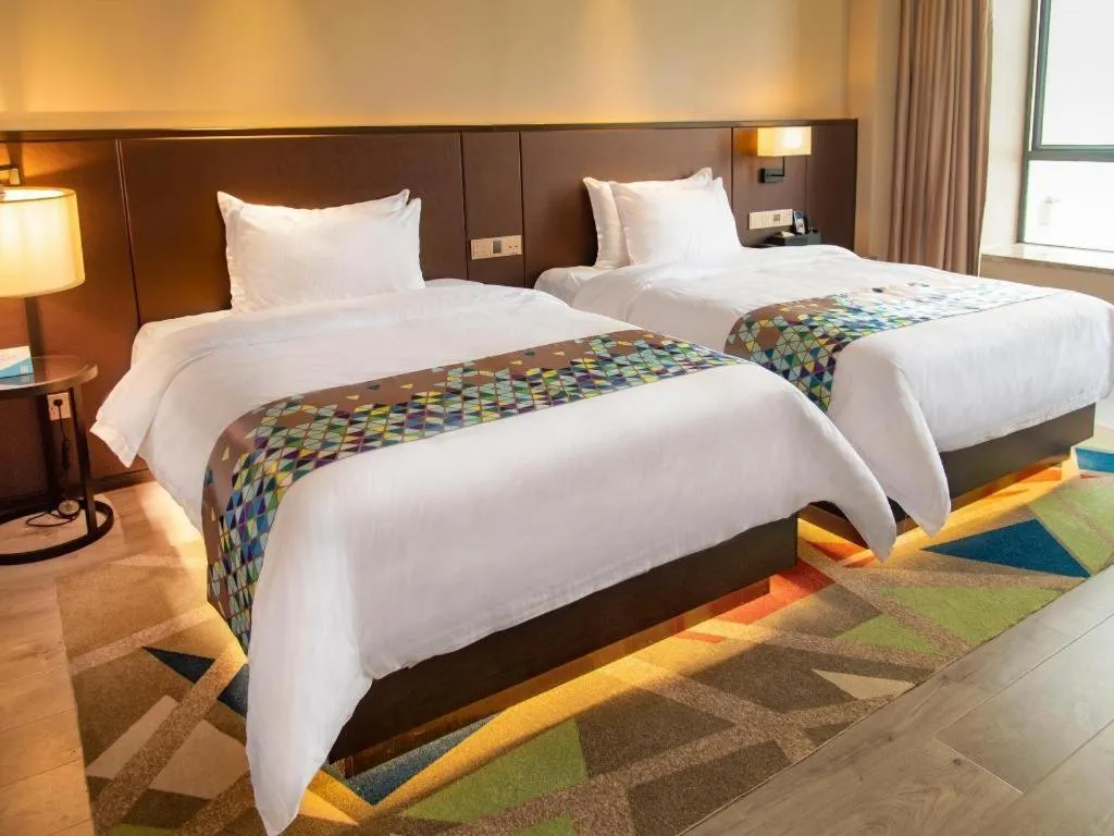 Bed in Zmax Hotel Guangzhou Railway Station