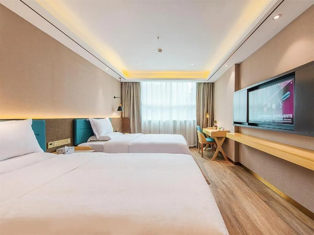 Bed in Zmax Hotel Guangzhou Railway Station