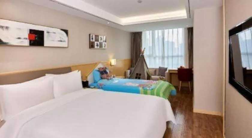 Bed in YUN-RAY Ambassador Hotel