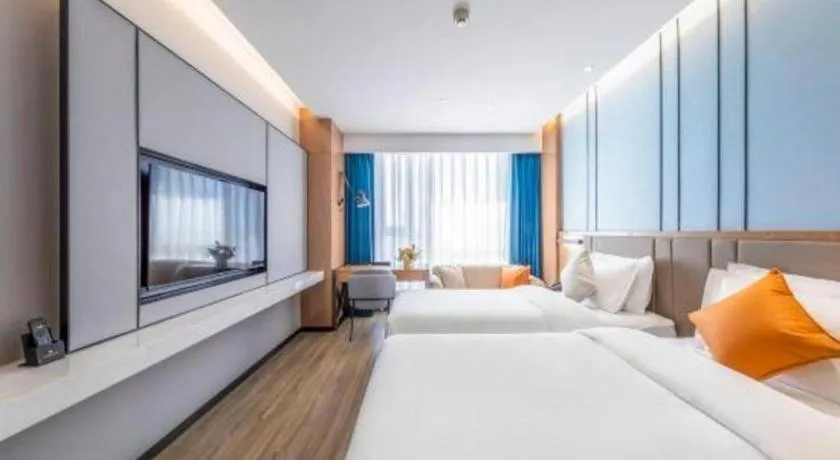 Bed in YUN-RAY Ambassador Hotel