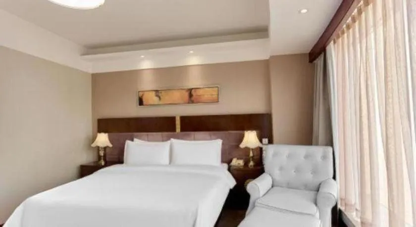 Bed in YUN-RAY Ambassador Hotel