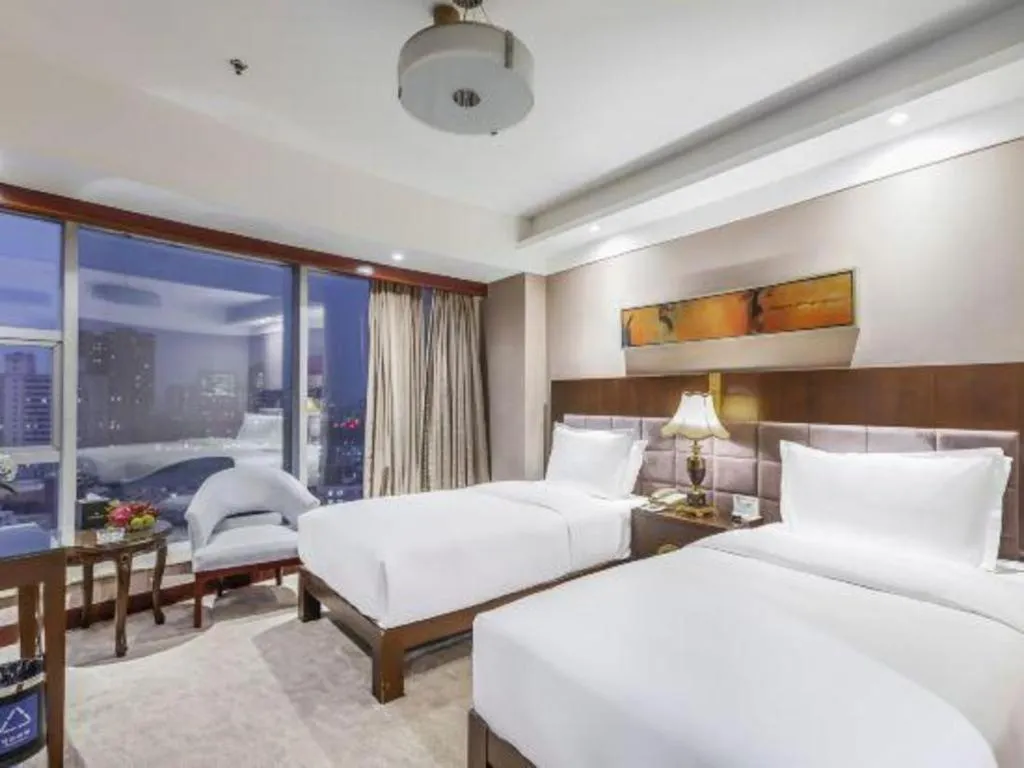 Bed in YUN-RAY Ambassador Hotel