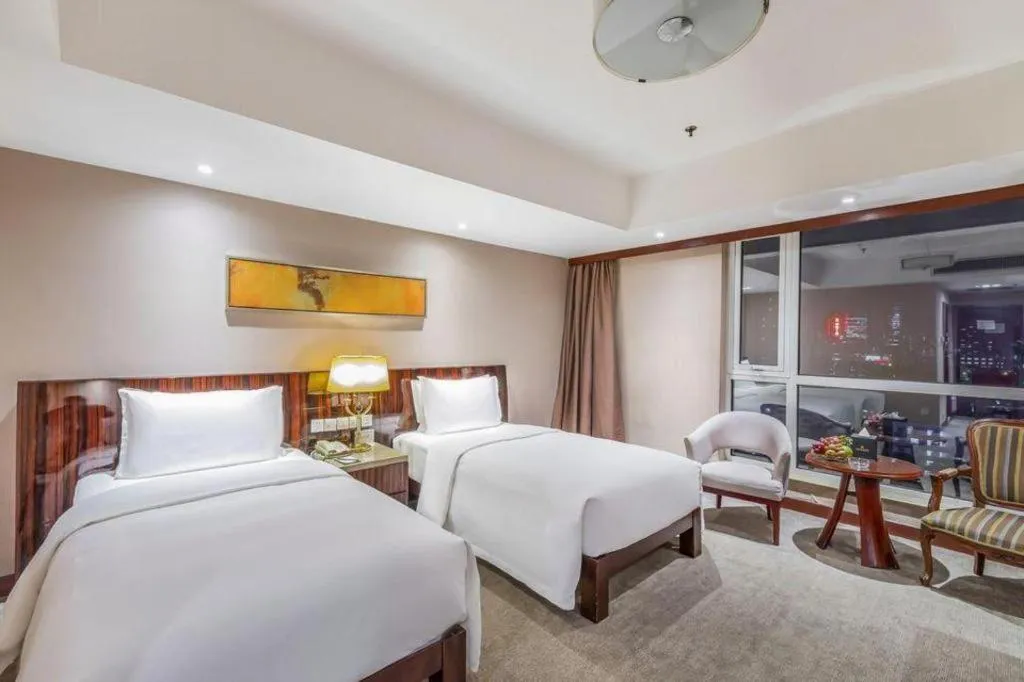 Bed in YUN-RAY Ambassador Hotel