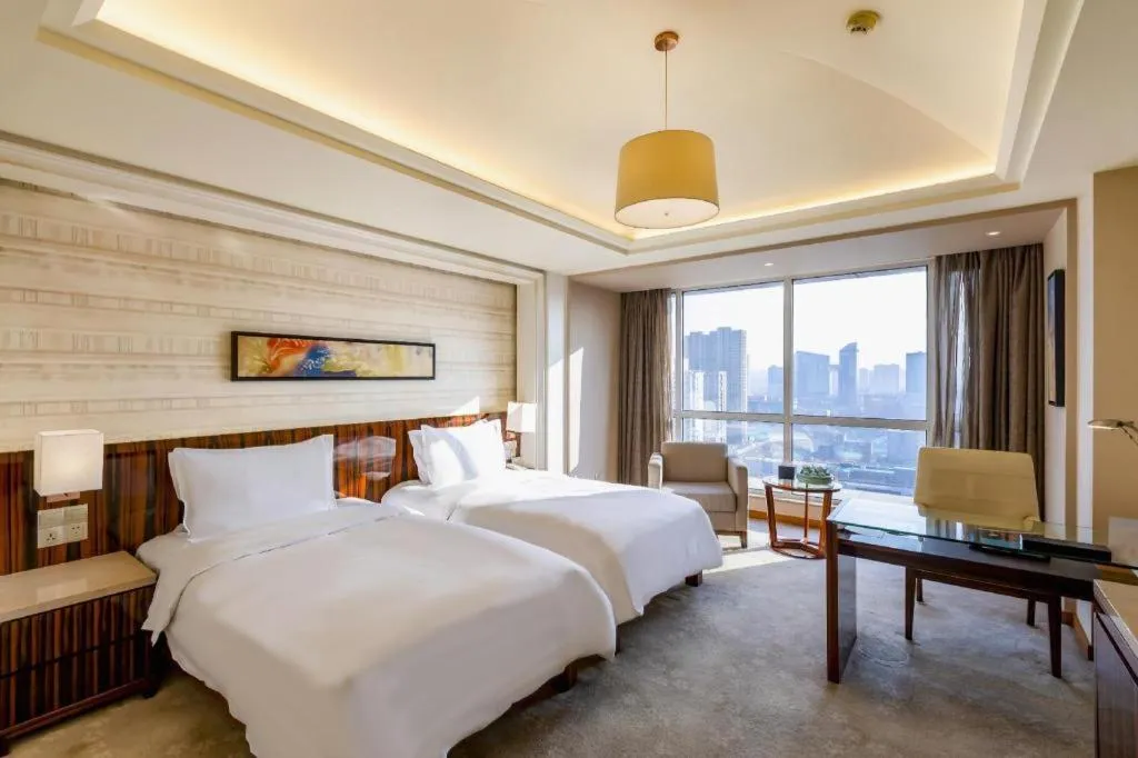 Bed in YUN-RAY Ambassador Hotel