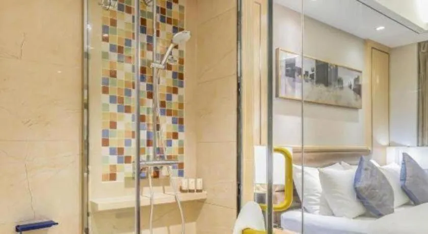 Bed in YUN-RAY Ambassador Hotel