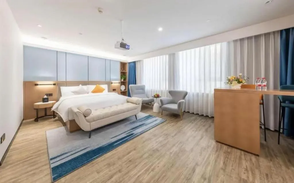 Bed in YUN-RAY Ambassador Hotel