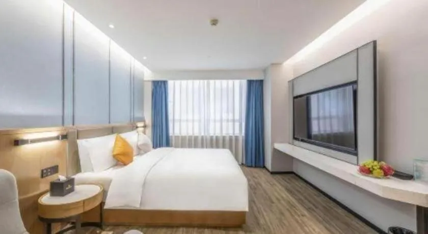 Bed in YUN-RAY Ambassador Hotel