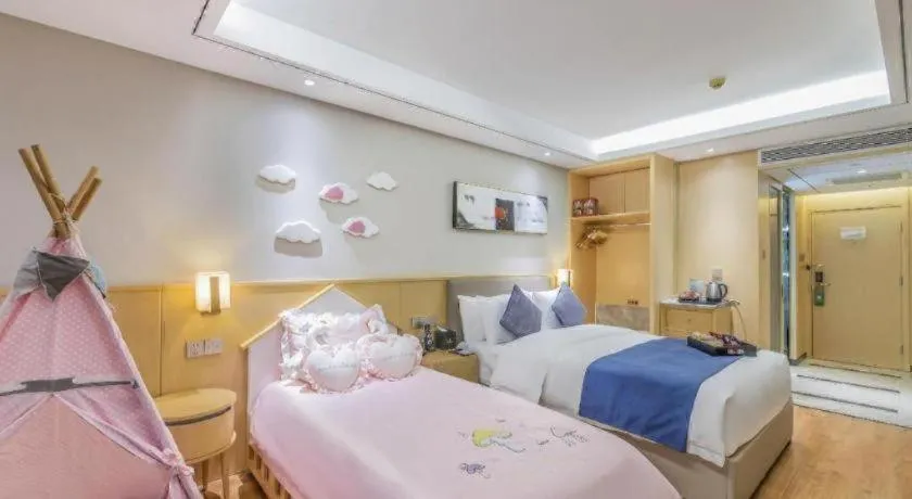 Bed in YUN-RAY Ambassador Hotel