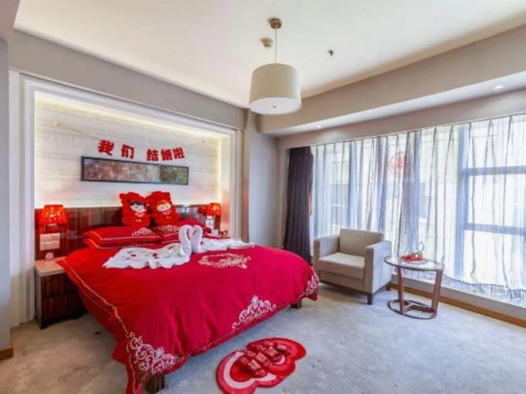 Bed in YUN-RAY Ambassador Hotel