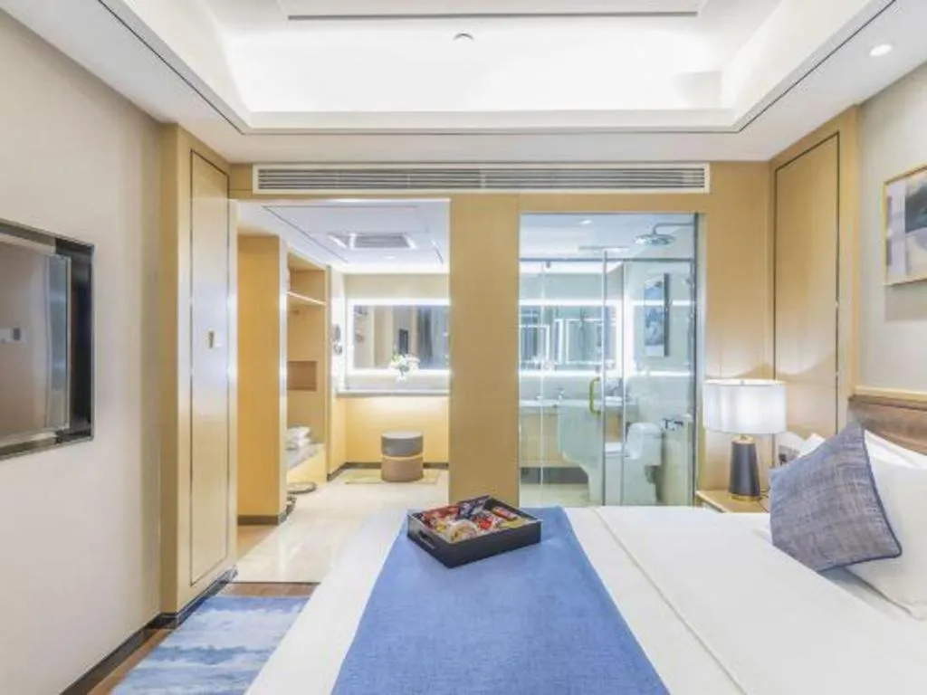 Bed in YUN-RAY Ambassador Hotel