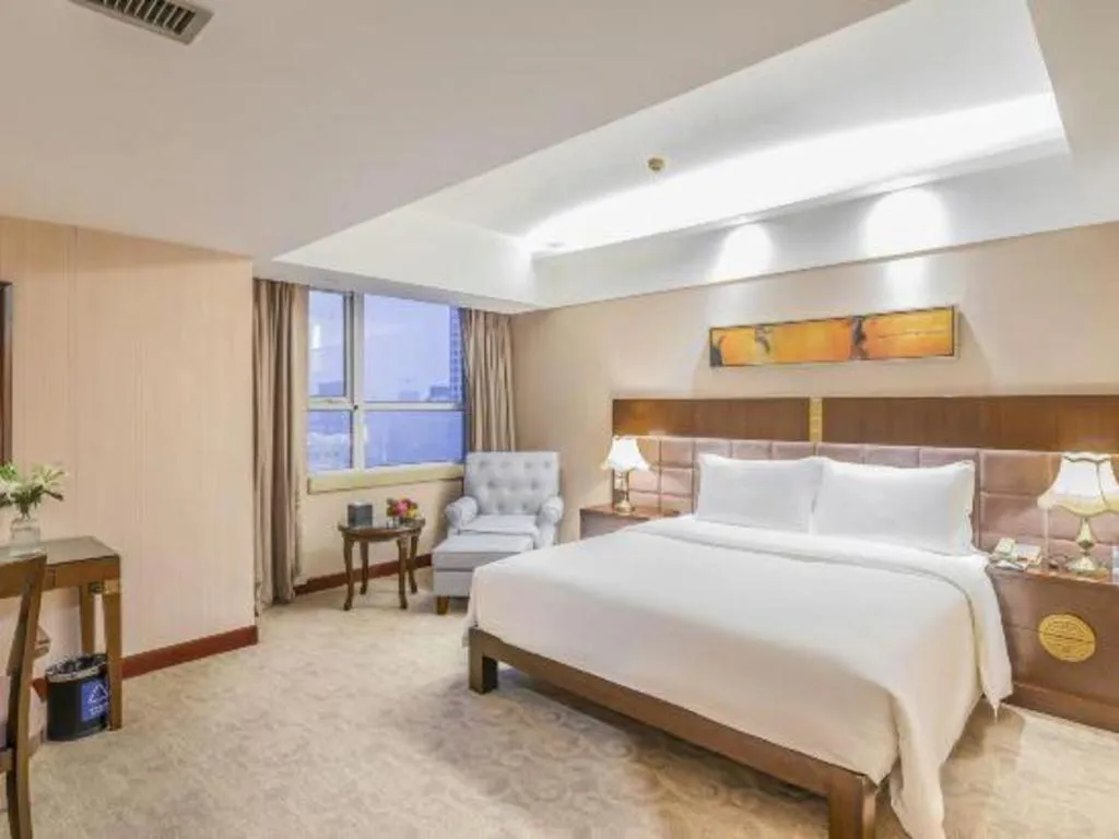 Bed in YUN-RAY Ambassador Hotel