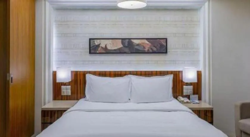 Bed in YUN-RAY Ambassador Hotel