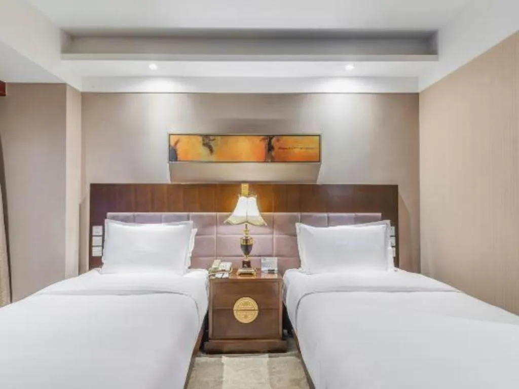 Bed in YUN-RAY Ambassador Hotel