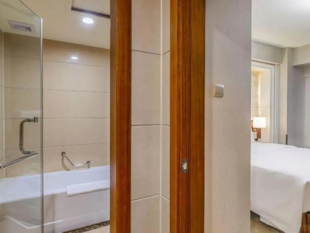 Bed in YUN-RAY Ambassador Hotel