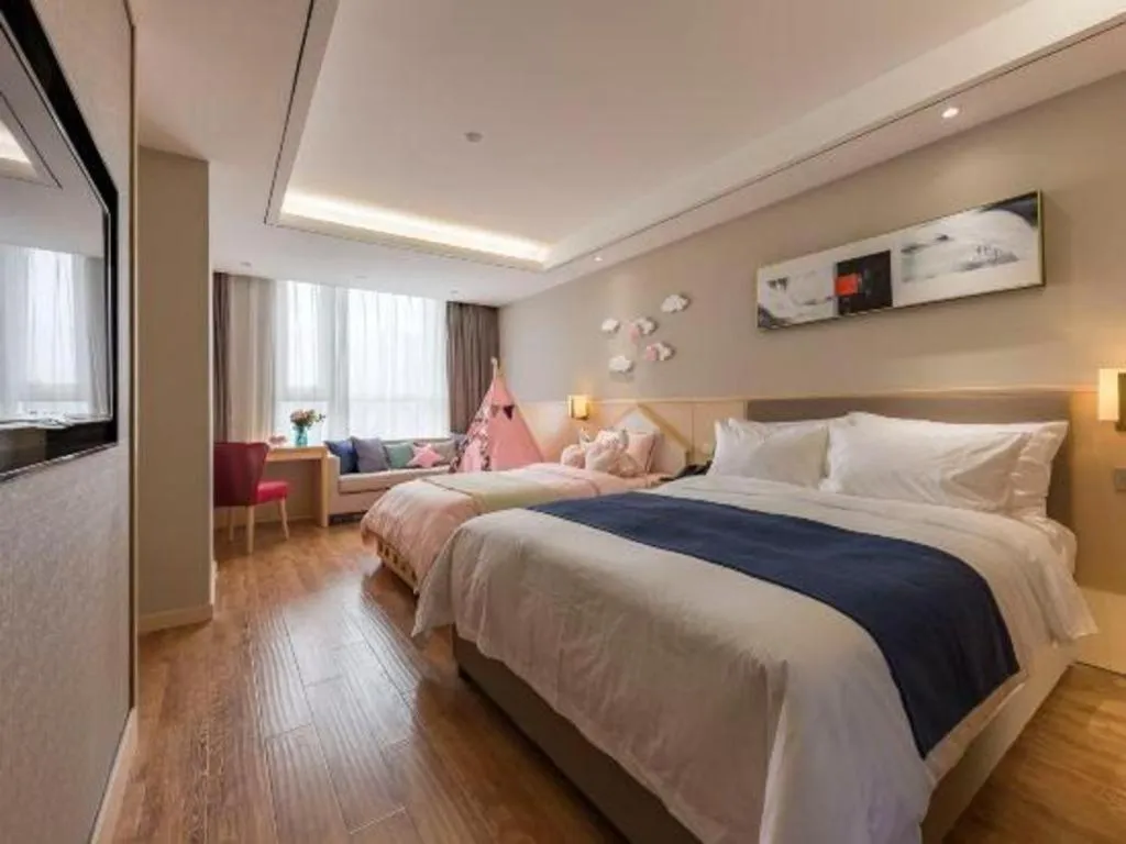 Bed in YUN-RAY Ambassador Hotel