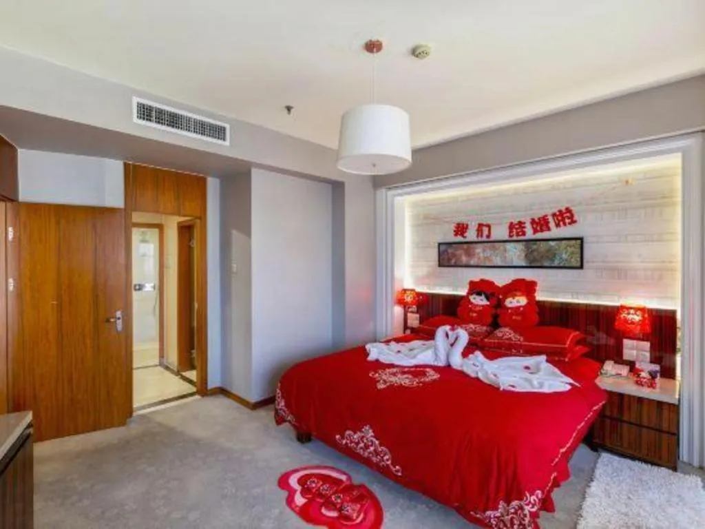 Bed in YUN-RAY Ambassador Hotel