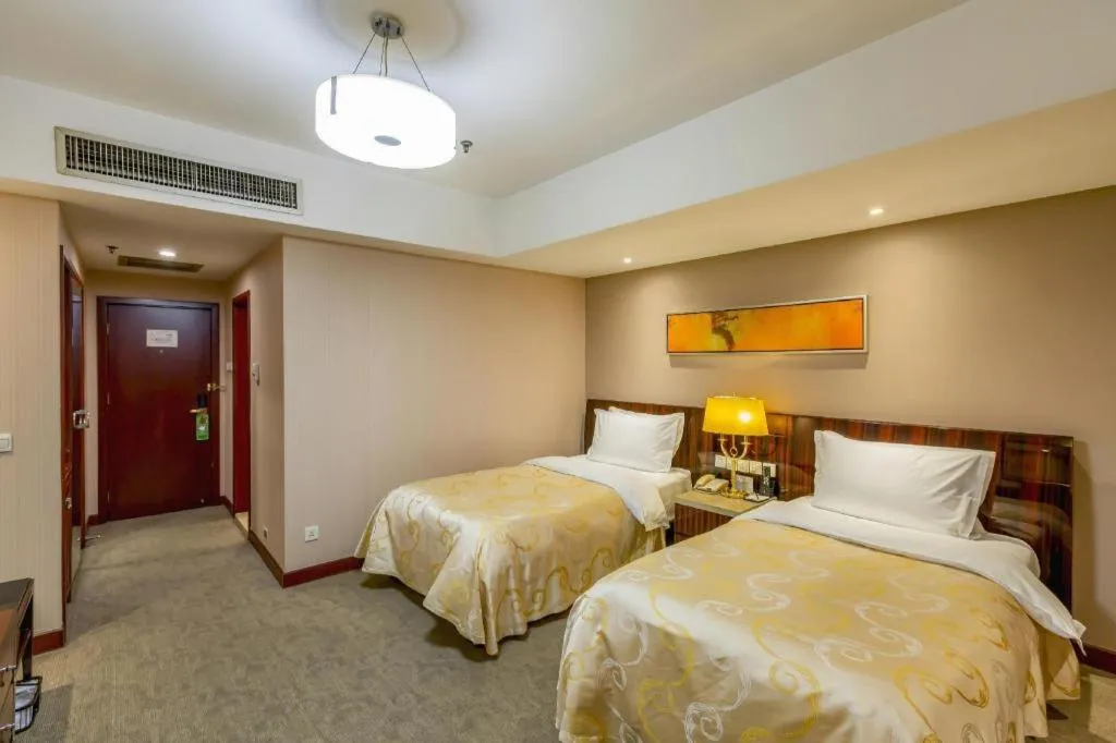 Bed in YUN-RAY Ambassador Hotel