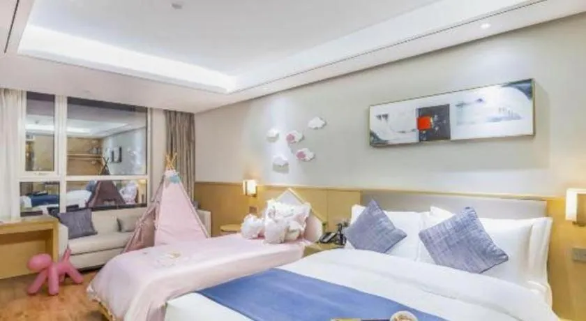 Bed in YUN-RAY Ambassador Hotel