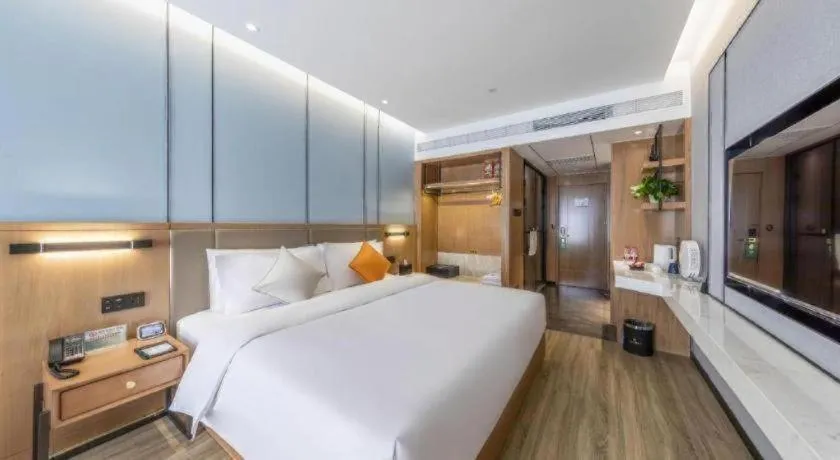 Bed in YUN-RAY Ambassador Hotel