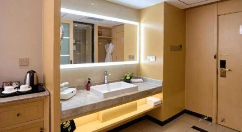 Bed in YUN-RAY Ambassador Hotel