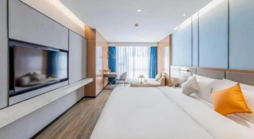 Bed in YUN-RAY Ambassador Hotel