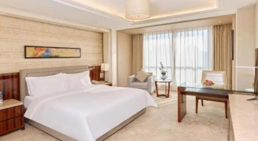 Bed in YUN-RAY Ambassador Hotel