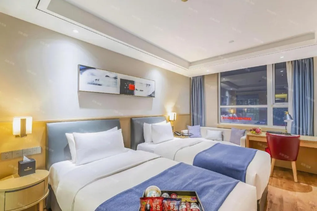 Bed in YUN-RAY Ambassador Hotel