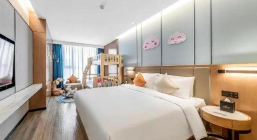 Bed in YUN-RAY Ambassador Hotel