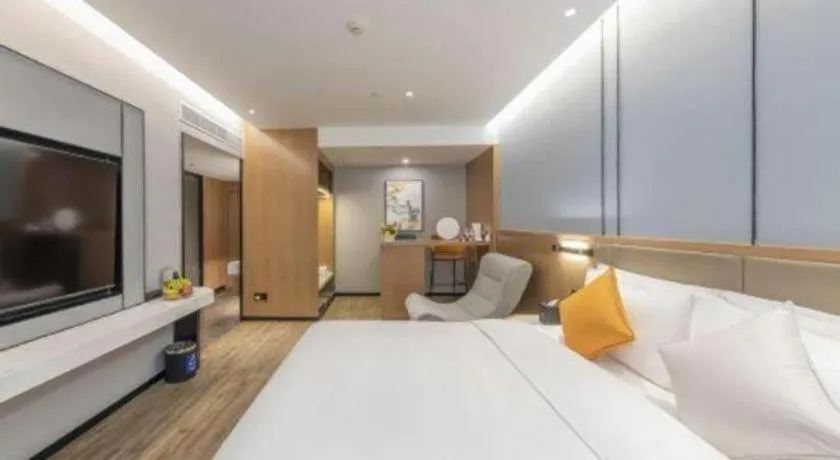 Bed in YUN-RAY Ambassador Hotel