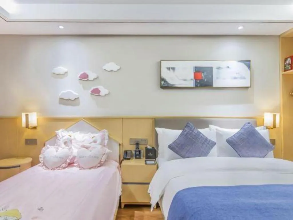 Bed in YUN-RAY Ambassador Hotel