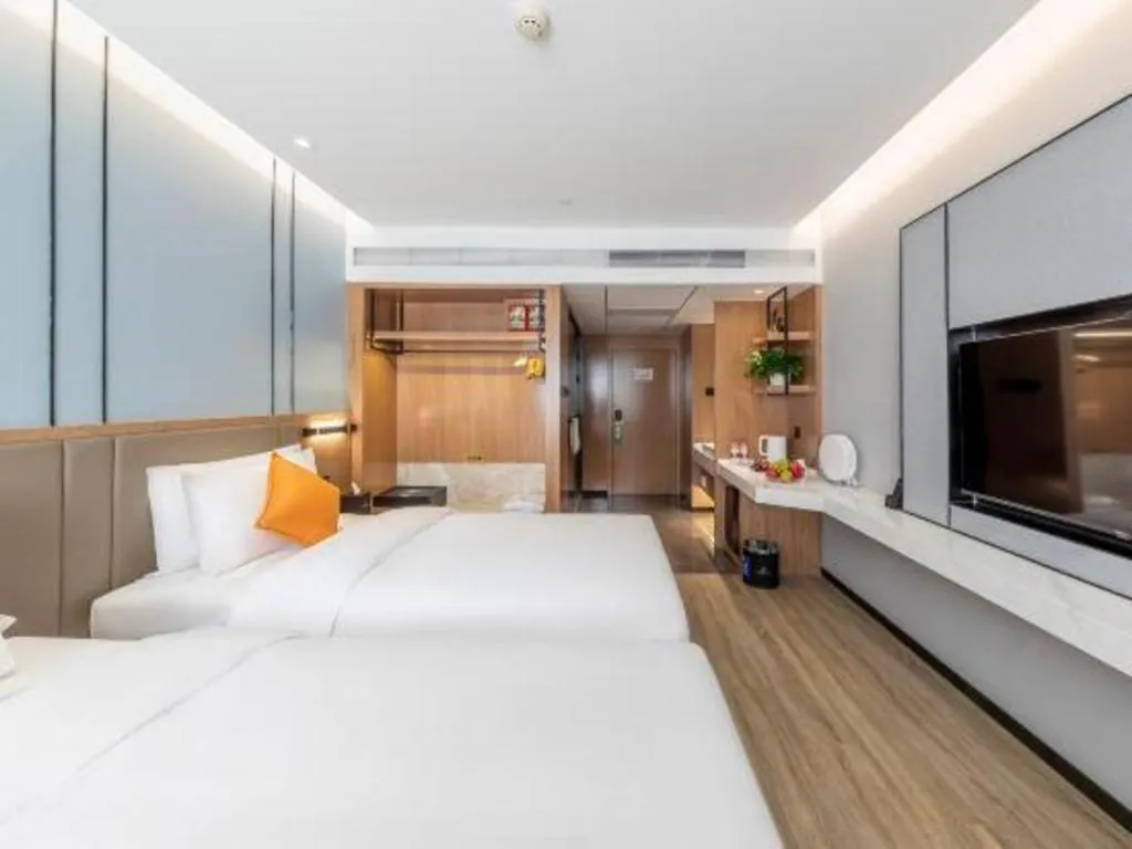 Bed in YUN-RAY Ambassador Hotel