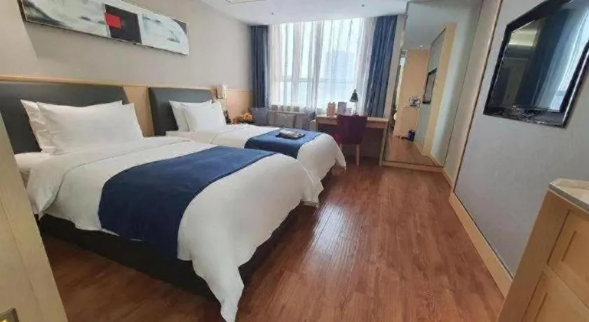 Bed in YUN-RAY Ambassador Hotel