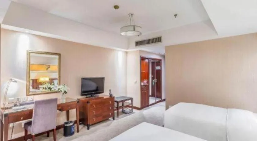 Bed in YUN-RAY Ambassador Hotel