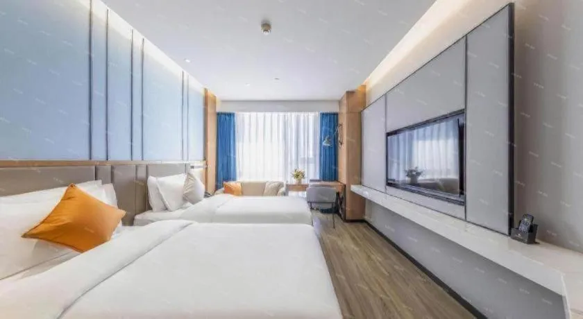 Bed in YUN-RAY Ambassador Hotel