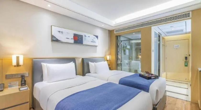 Bed in YUN-RAY Ambassador Hotel