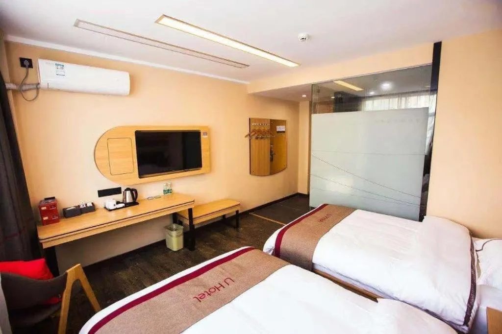 Bed in Thank Inn Hotel Guangdong Zhuhai Jiwan Hongqi Central Sqaure