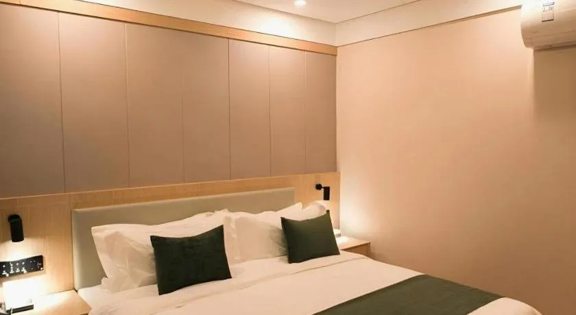 Bed in GreenTree Inn Express Hebei Tangshan Caofeidian Industrial Park 11 Plus Bus Station