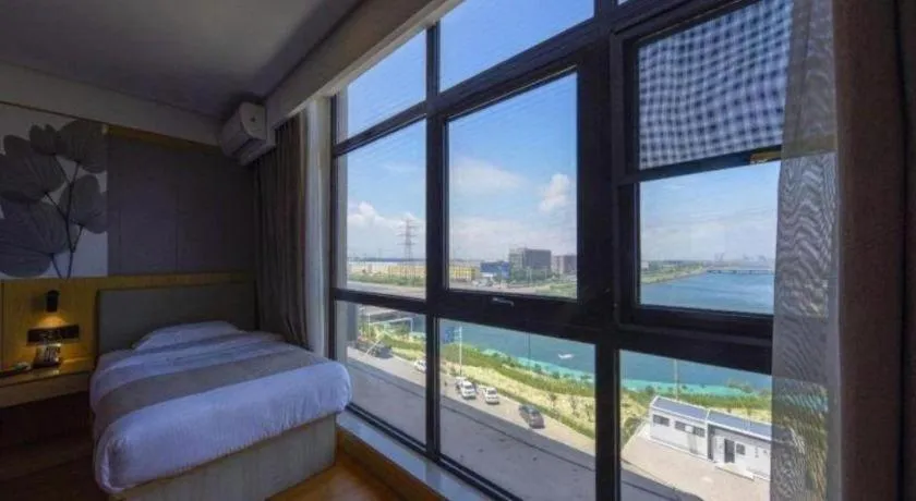 Bed in GreenTree Inn Express Hebei Tangshan Caofeidian Industrial Park 11 Plus Bus Station