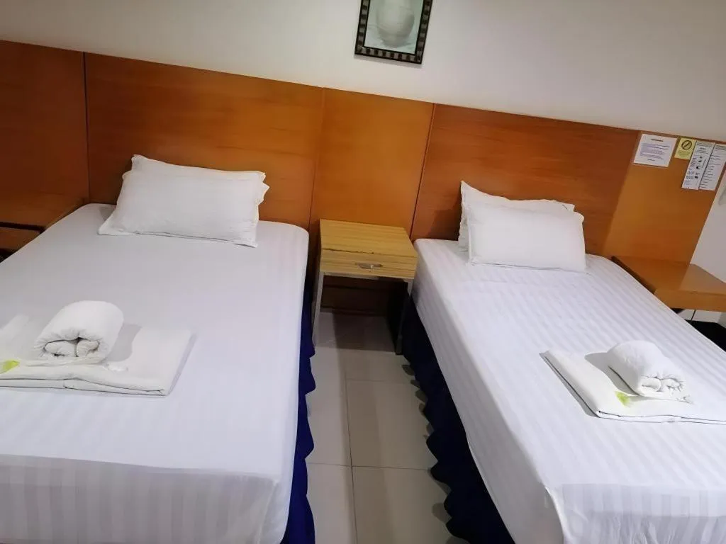 Bed in Jeamco Royal Hotel - Pasig