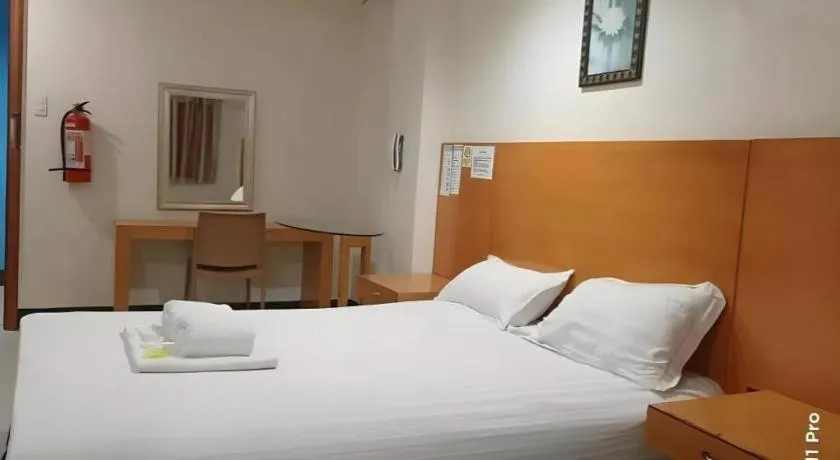 Bed in Jeamco Royal Hotel - Pasig