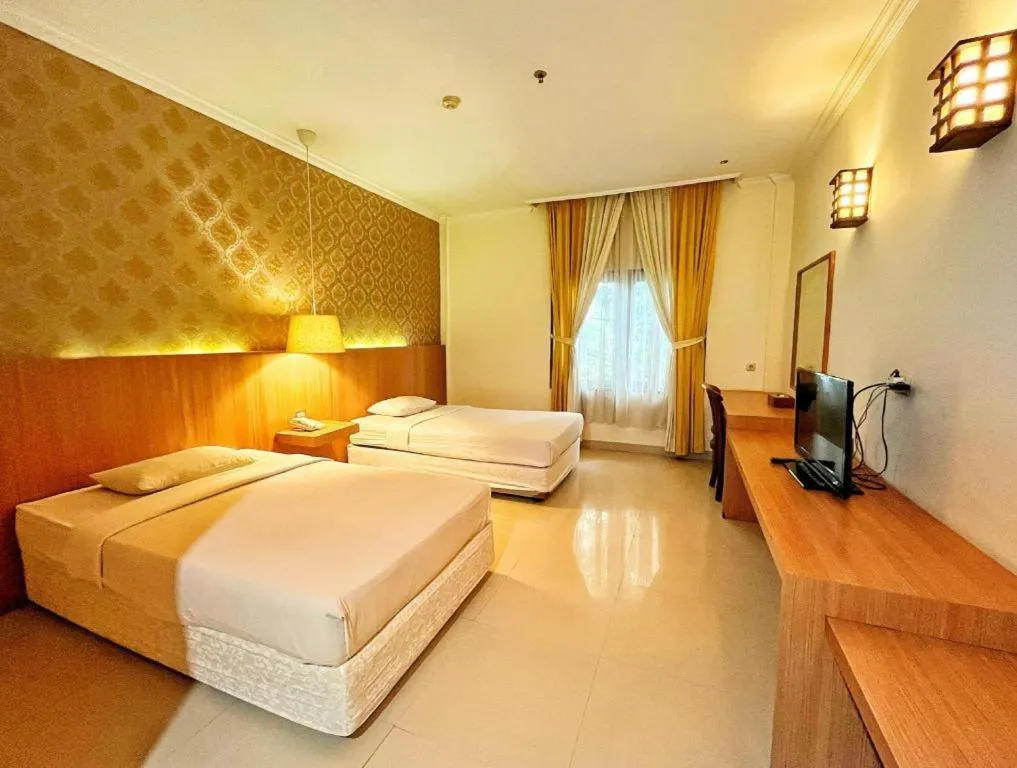 Bed in HOTEL SARI KURING INDAH