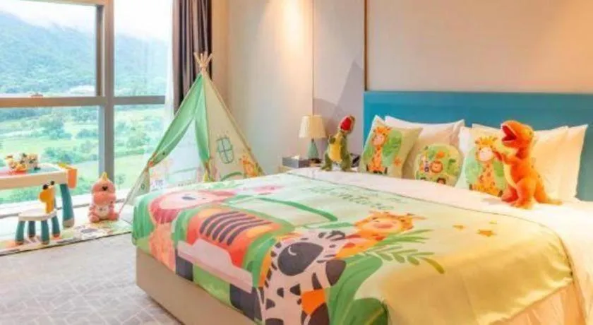 Bed in Zhuhai Hongsanyi Hotel