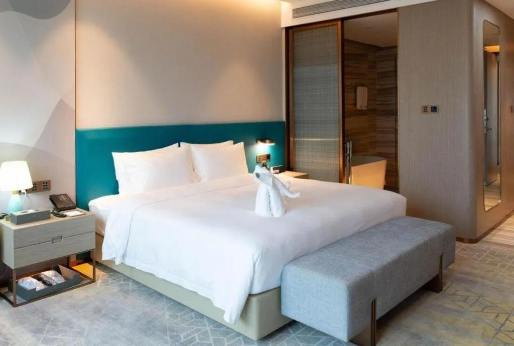 Bed in Zhuhai Hongsanyi Hotel